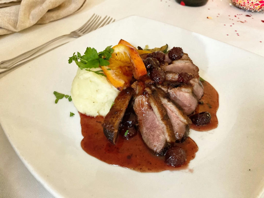 Duck breast with a cranberry orange sauce, mash and vegetables - February 2023