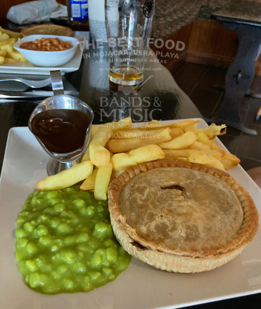 Minced Beef Pie, Chips & Mushy Peas with Gravy - October 2023