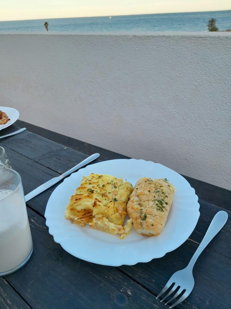 Creamy fish pie with cheesy garlic bread - May 2024