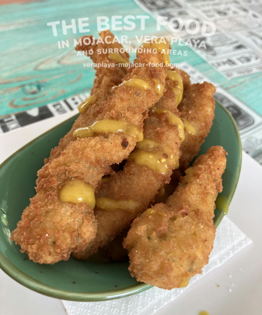 Chicken fingers with curry/mango sauce - July 2024