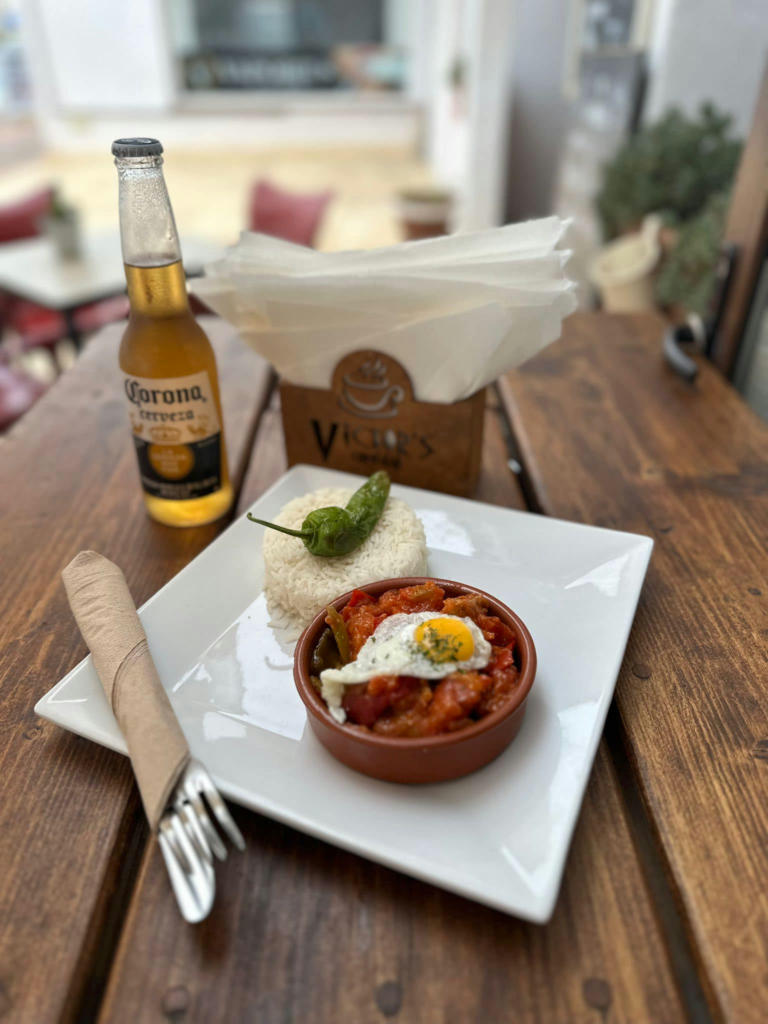 Pork in tomato sauce, rice (or bread) with a quail egg & padrón pepper - September 2023